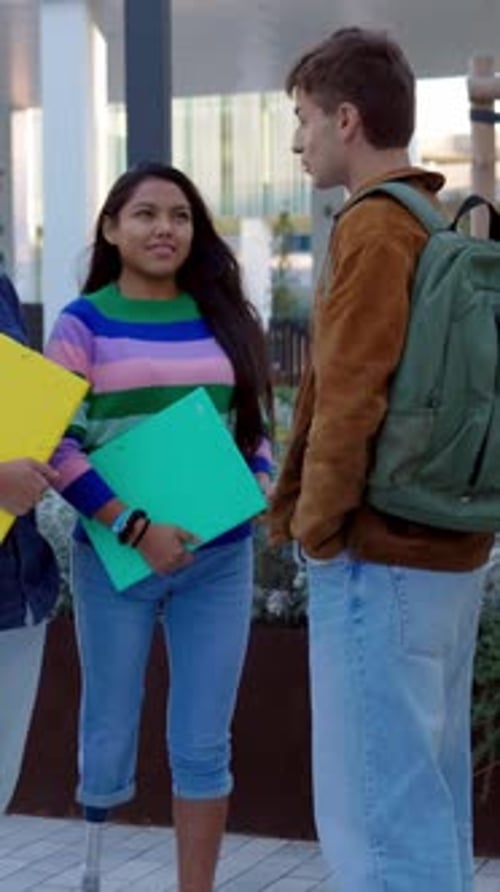 Three Diverse Student Friends Hanging Out While Standing at College Campus
