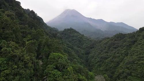 Aerial view of Merapi Mountain in indonesia with tropical forest around it