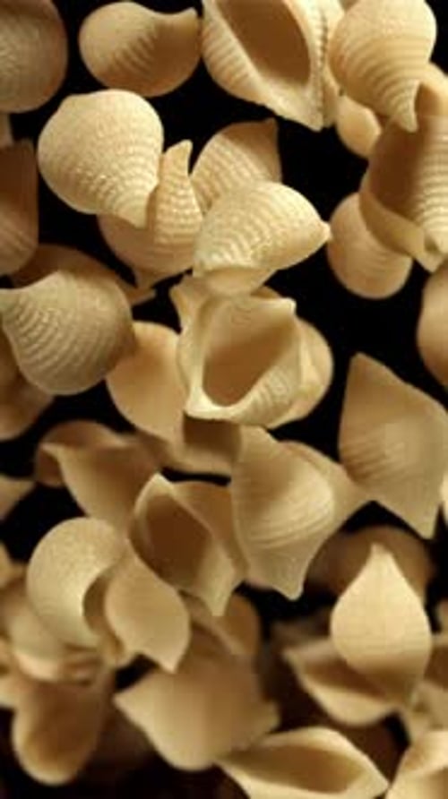 Dry Pasta Rises and Falls Filmed on a Highspeed Camera at 1000 Fps