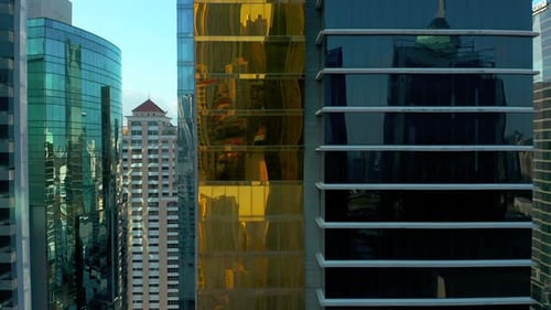 Glass Exterior Of A High-rise Buildings In Panama City, Panama. - aerial drone descend