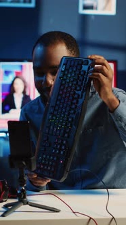 Enthusiastic Man Reviews Tech Gear for Online Video