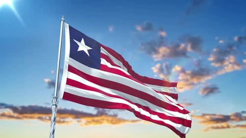 Realistic Liberia National Flag Waving in Bright Sky