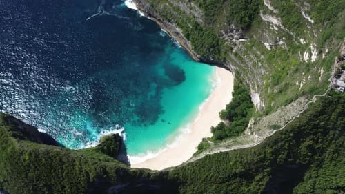 Aerial shot overhead the famous Kelingking Beach in Bali, Indonesia