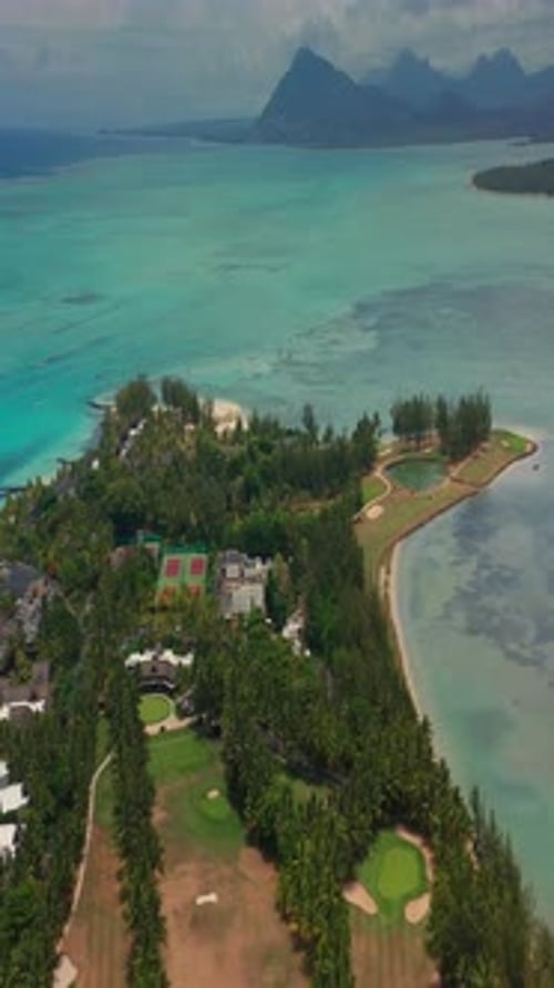 Close Up Fly Over Palm Trees and Beautiful Beach Lagoon Paradise Island in Mauritius Landscape View