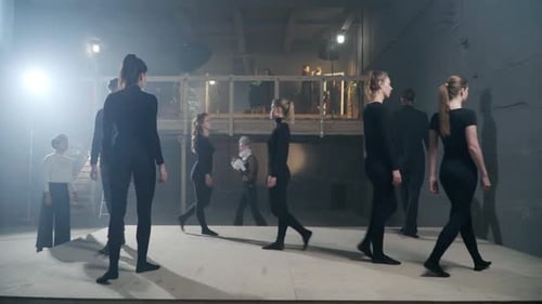 Dancers Walking in Urban Rehearsal Space
