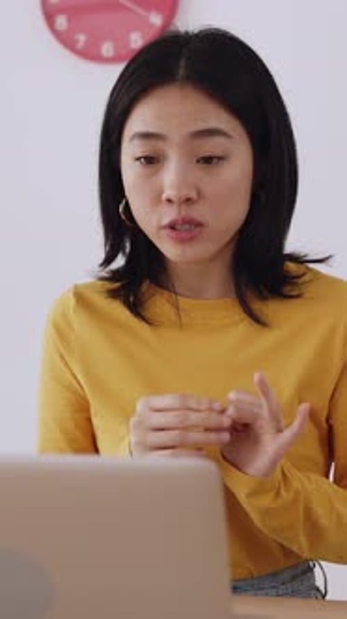 Young Adult Explaining Something on a Video Call