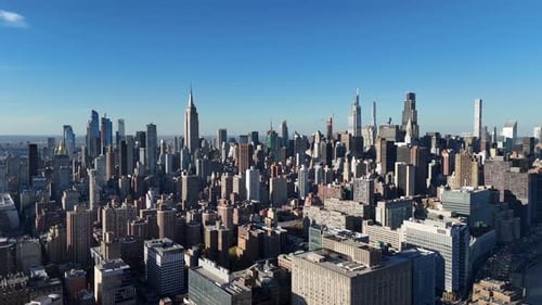 Aerial video above skyscrapers and skyline in Manhattan, New York