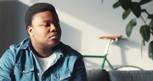 Portrait Young African American Man Look at Camera Feel Happy Smiling Face Close Up Slow Motion at