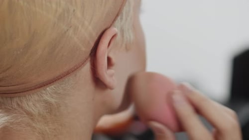 Face Getting Makeup Applied with Beauty Sponge