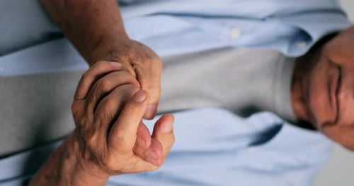Vertical clip. An Asian man has tingling and numbness in his hand which causes beriberi.