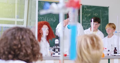 Science Class with Students Watching Experiment