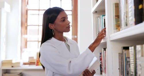 Books, studying and library with woman in college for research, education or learning