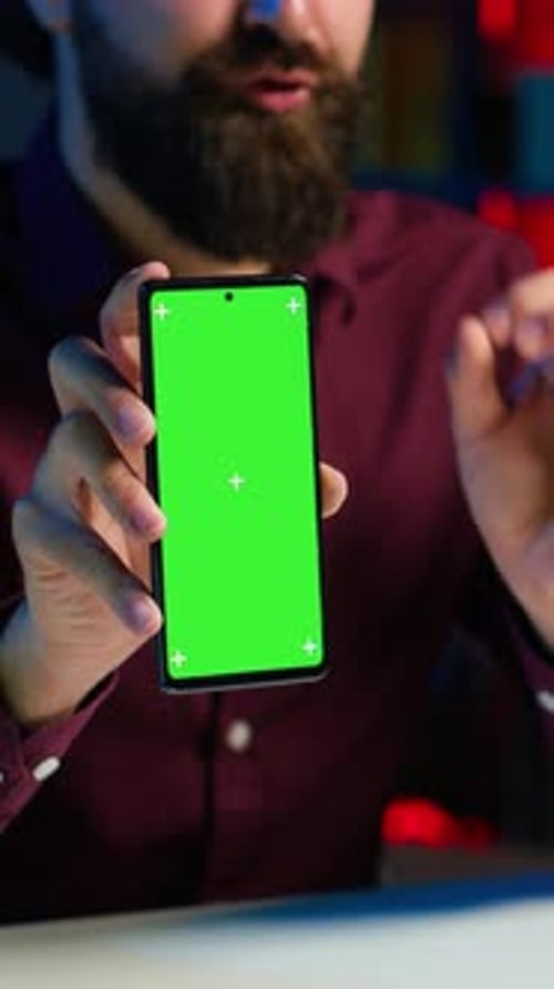 Vertical Video Content Creator Reviewing Mockup Phone Received From Sponsor Close Up