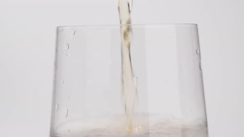 Refreshing Light Beverage Poured into a Glass