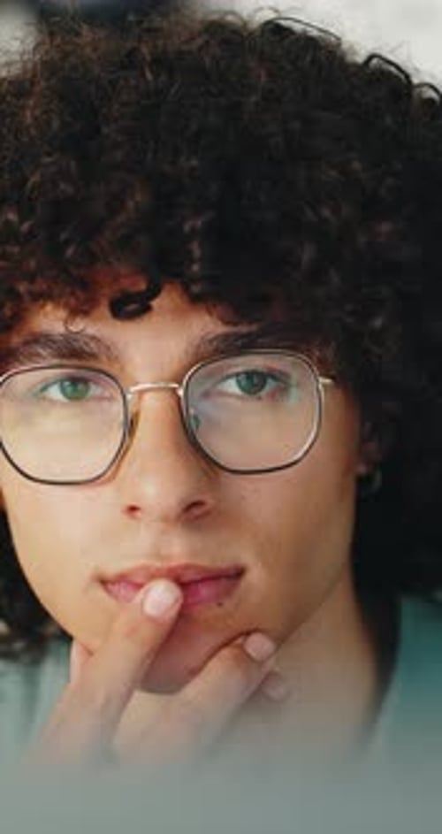 Man, face and programming with computer in office, reflection and planning for software development