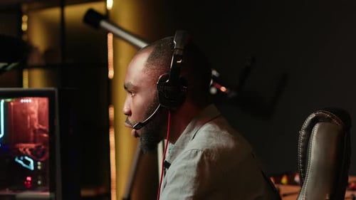 Close Up of Cheerful Esports Player Performing in Gaming Tournament