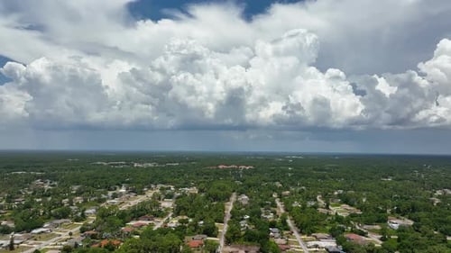 Dark Stormy Clouds Forming on Gloomy Sky Before Heavy Rainfall Over Suburban Town Area
