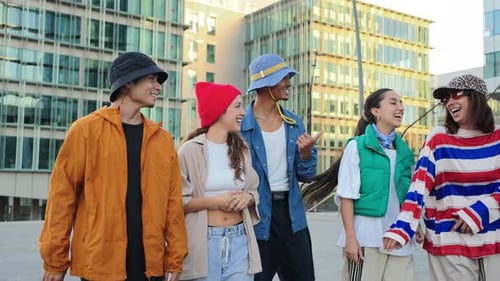 Group of Friends Laughing and Talking in the City