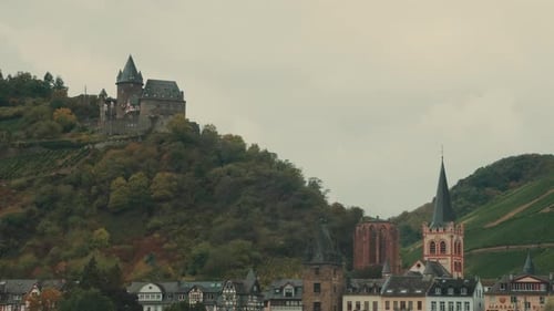4k German town with church and castle on hill