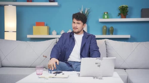 Man looking at camera confused.