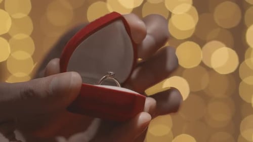Engagement Ring Presented in Heart-Shaped Red Box
