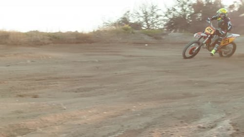 Bikers are Racing on the Beach with Motocross