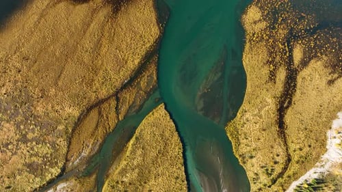 Banff National Park, Canada. A drone view of the river on the field. An aerial landscape