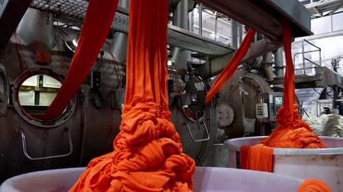 Textile Factory: Automated Dyeing of Bright Orange Clothing
