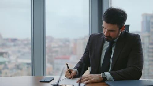 Serious Boss Reading Report Putting Signature on Paper Close Up Man Paperwork