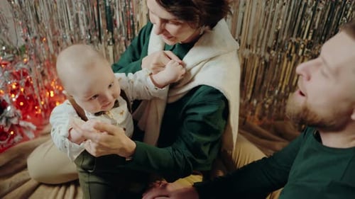 Festive Family Celebrating Christmas Together at Home