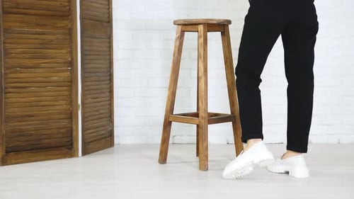 Trendy Black Pants and White Loafers Style