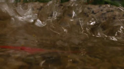 Water splashes into fountain, close-up