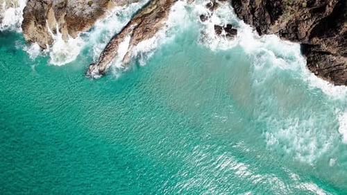 Ocean Waves Crashing On The Rocky Coastline Of Noosa Heads, QLD, Australia. - aerial shot