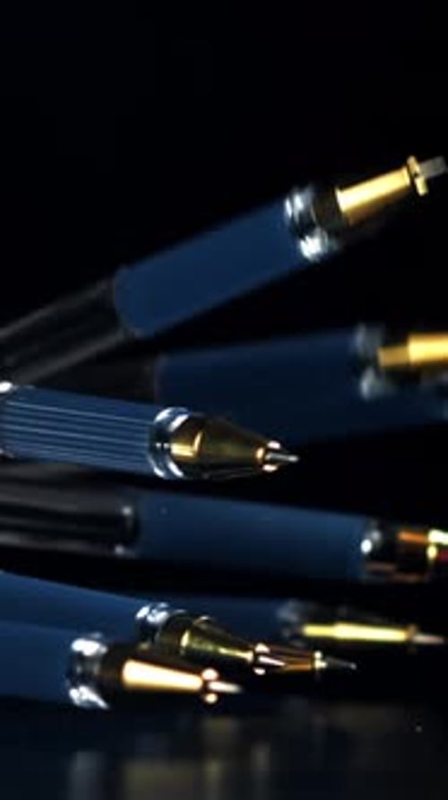 Pens Fall on the Table Filmed on a Highspeed Camera at 1000 Fps