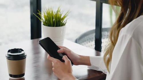 Happy Female Lifestyle Sitting in Cafe Near Window She Cellphone on Mobile Phone