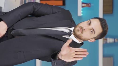 Man in Suit Gesturing Stop With Hand