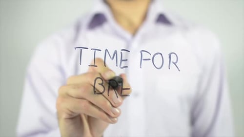 Writing Time For Break On Clear Surface