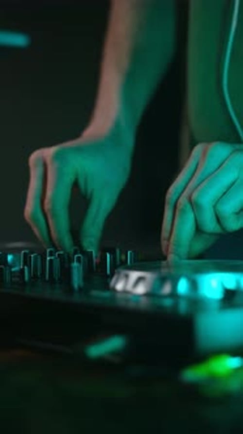 Dj Mixing and Scratching on a Turntable Console