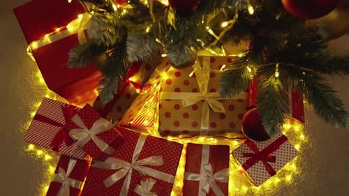 Festive Christmas Tree with Gifts and Lights
