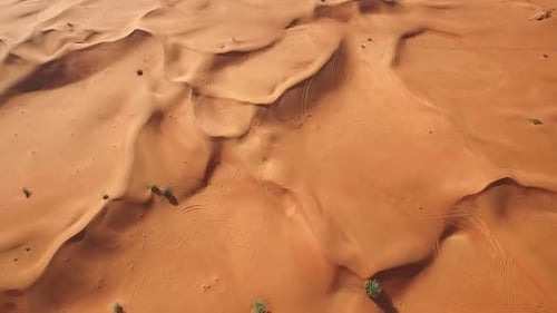 Spectacular Desert Aerial Shot with Rolling Sand Dunes in 4K
