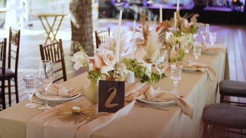 Elegant Wedding Table Setting With Floral Centerpieces