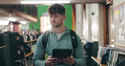 College, man and search with tablet in campus library for book study or online course