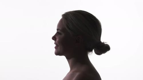 Woman Silhouette Talking and Smiling on White