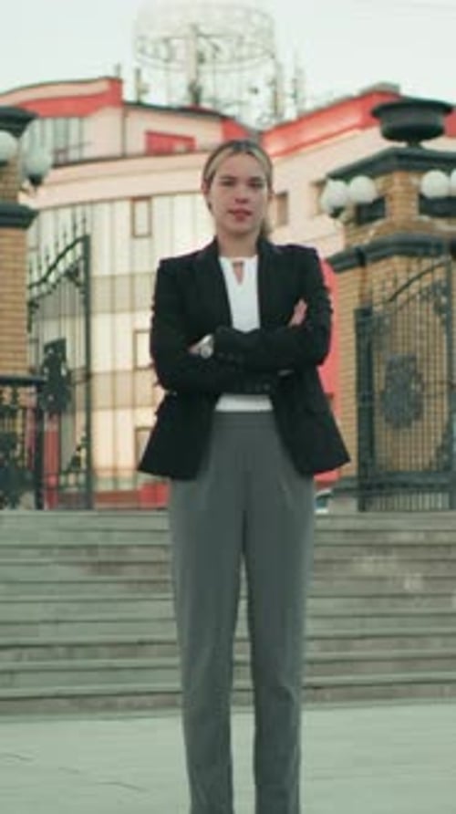 Confident Woman in Business Attire Stands Firmly