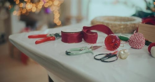 Christmas Ornaments and Crafting Tools on Tabletop
