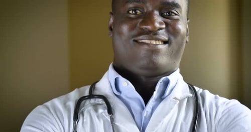 Smiling Doctor in White Coat Close Up