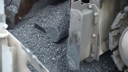 Process of asphalting road construction infrastructure by spreading, compressing, compacting, leveli