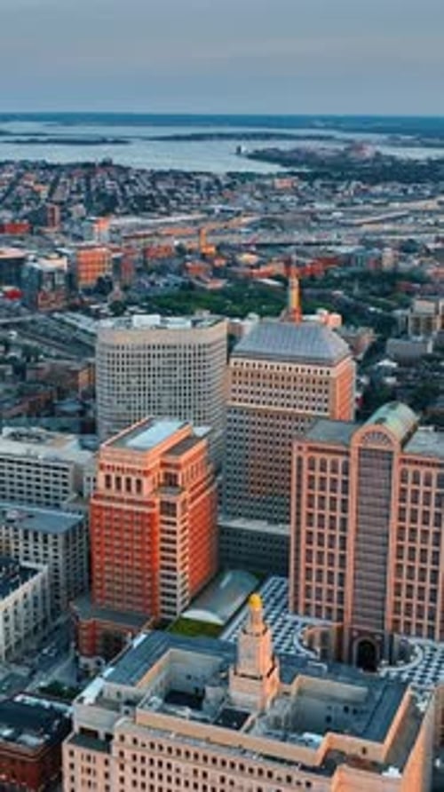 John Hancock Tower in the Back Bay neighborhood of Boston. Top view. City scenery after sunset.