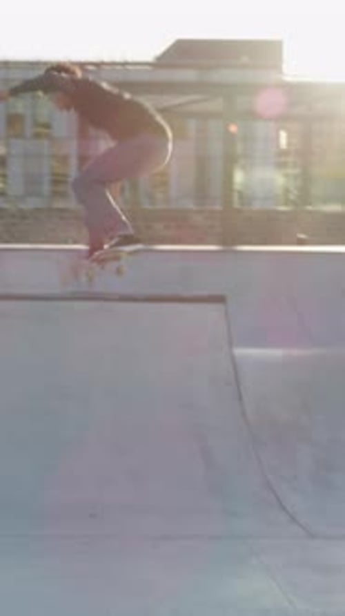 Man, skateboard and balance on ramp at park, tricks or speed with riding at urban town