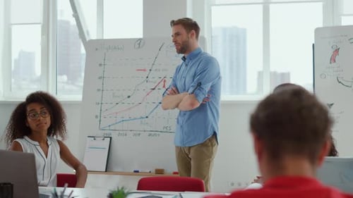 Business presentation by man in modern workplace environment